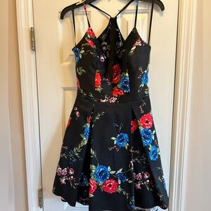 B. Smart Wedding Guest Dress. Floral Print and Pleated front bottom
